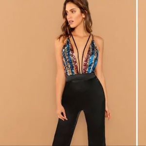 🆕 Plunging neck sequin halter jumpsuit